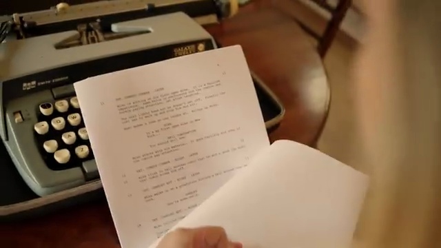 A letter resting beside a typewriter